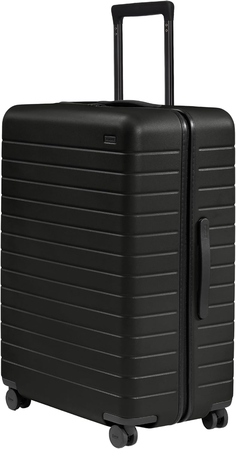image:imageAway Amazon Exclusive Large Checked Luggage 29Inch Lightweight Hardside Suitcase with Four WhisperGlide 360 Spinner Wheels Interior Compression System TSAAccepted Lock Sky BlueJet Black