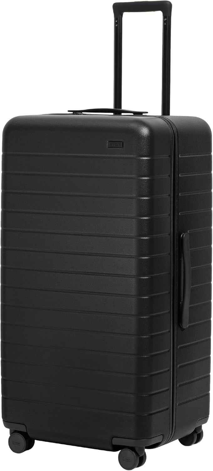 image:imageAway Amazon Exclusive Large Checked Luggage 29Inch Lightweight Hardside Suitcase with Four WhisperGlide 360 Spinner Wheels Interior Compression System TSAAccepted Lock Sky BlueJet Black