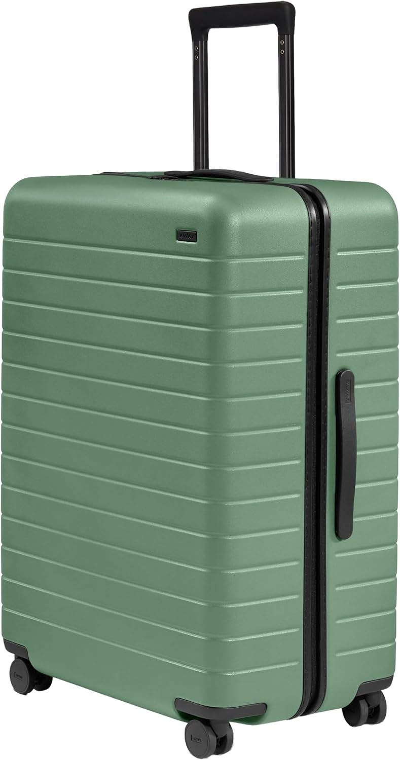 image:imageAway Amazon Exclusive Large Checked Luggage 29Inch Lightweight Hardside Suitcase with Four WhisperGlide 360 Spinner Wheels Interior Compression System TSAAccepted Lock Sky BlueSea Green